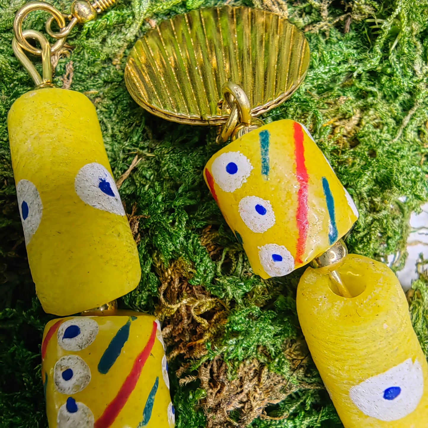 Boucle d'oreille "œil-jaune"