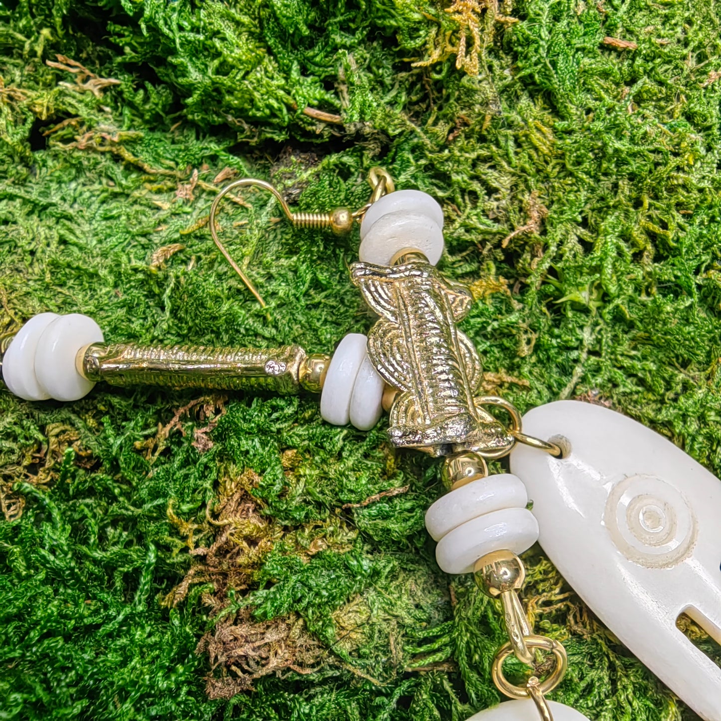 Boucle d'oreille "peigna - ossa"